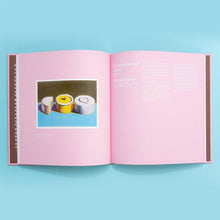 Load image into Gallery viewer, Open book with pink pages on a light blue background
