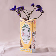 Load image into Gallery viewer, Decorative paper vase with floral design and purple flowers on a light pink background