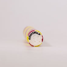 Load image into Gallery viewer, Colorful cylindrical object with 'Courtaulds' branding on a light gray background