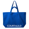 Blue tote bag with 'Courtauld' branding on a white background