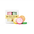 Colorful citrus fruit slices with packaging labeled 'Sidewalk Chalk' on a white background