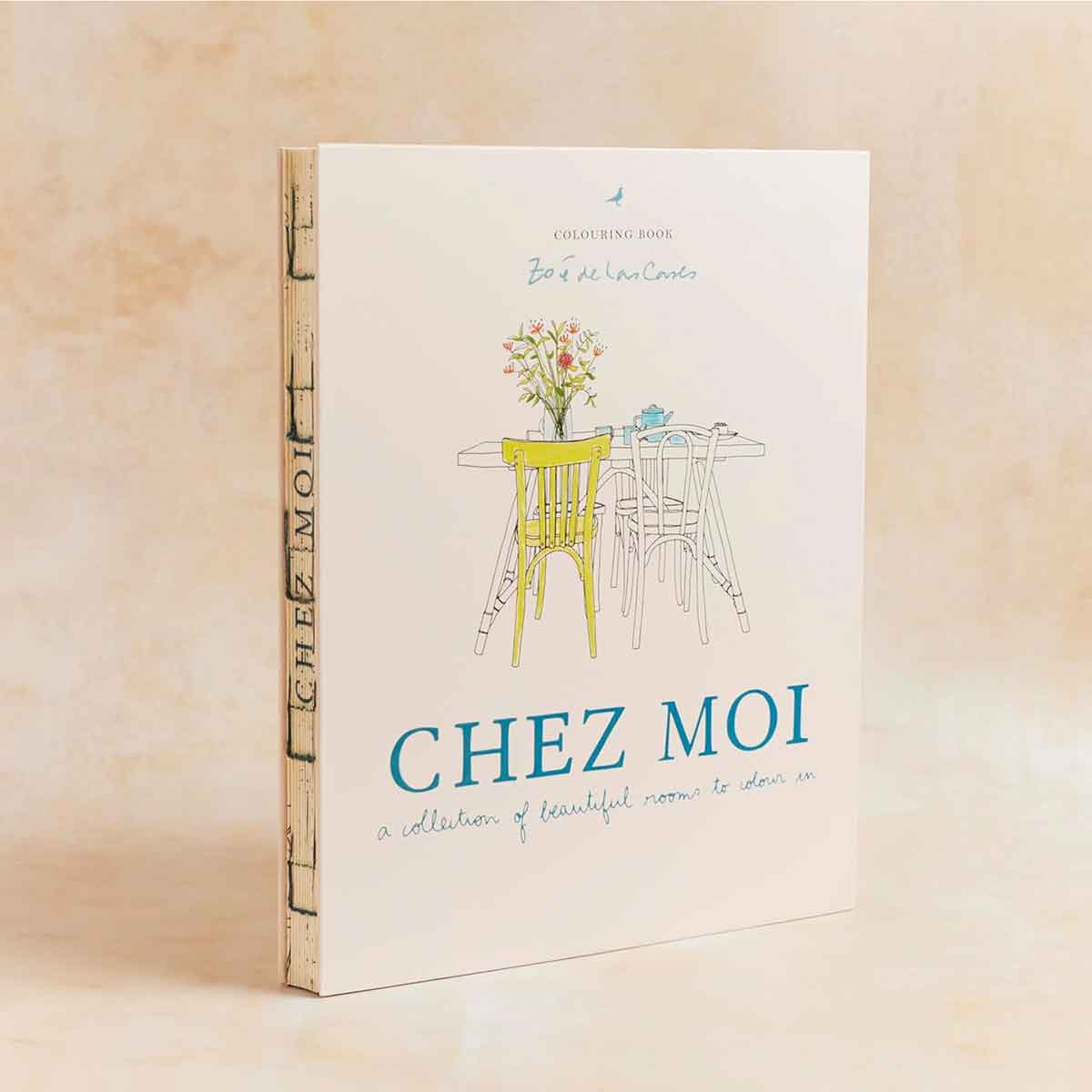 Book titled 'Chez Moi' with a cover illustration of a table and chairs on a beige background
