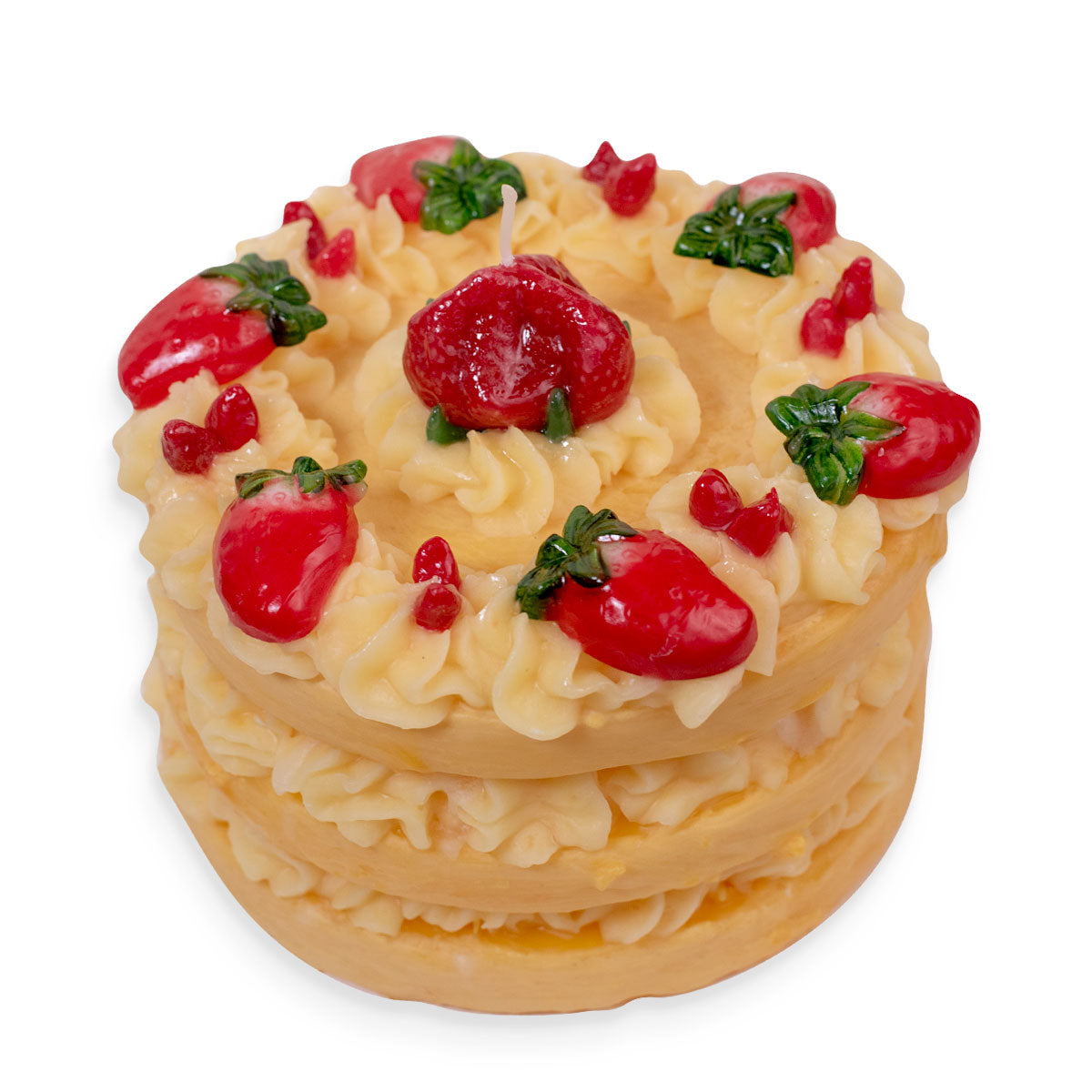 Candle shaped like a Two-layered cake with strawberry and leaf decorations on a white background