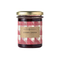 Jar of 'Cherry Amour' jam with a decorative label on a white background