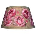 Lampshade with pink floral design on a beige background