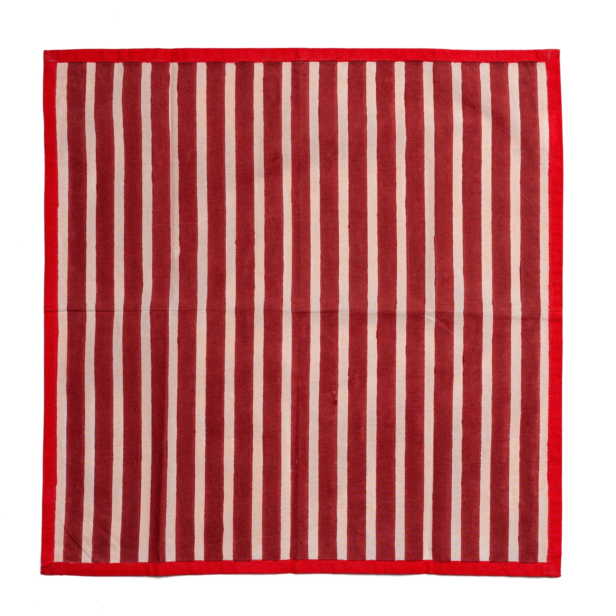 Red and white striped towel on a white background