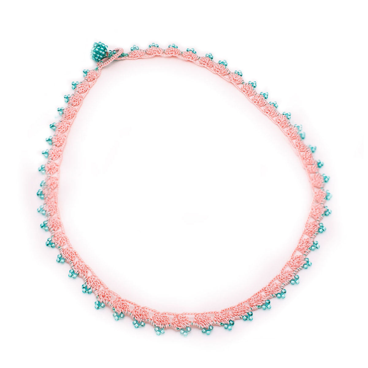 Intricate necklace in light pink and turquoise beads