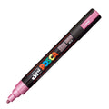 Pink marker with 'Posca' branding on a white background