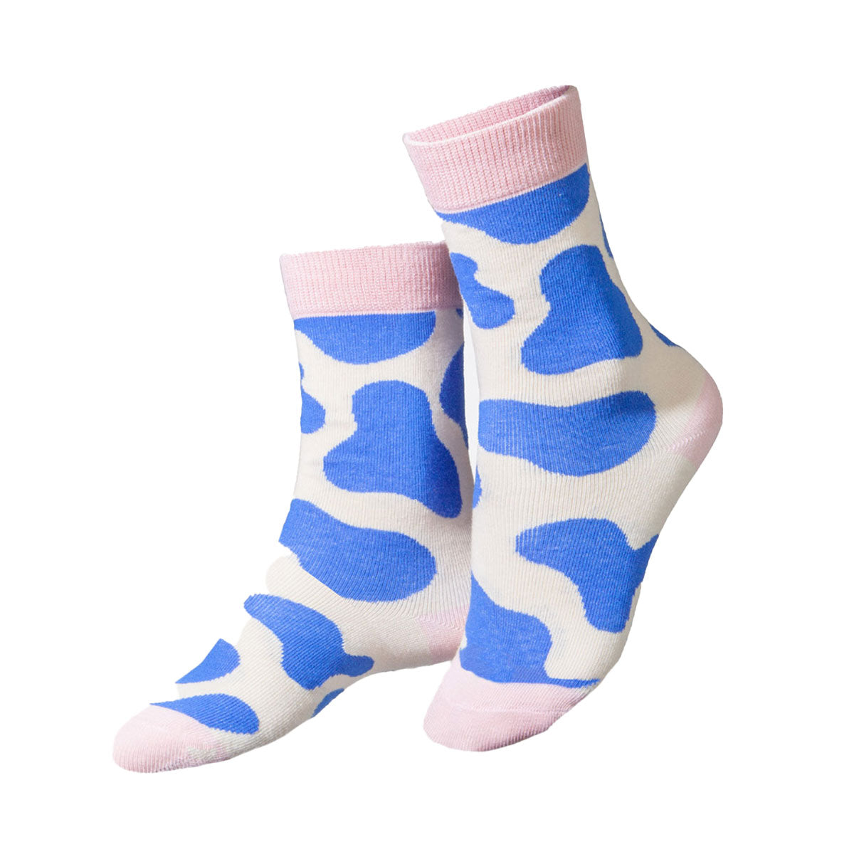 Pair of socks with blue cow print and pink accents on a white background