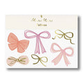 Set of bow-shaped tattoos on a white card with 'Mimi Mimi' branding.