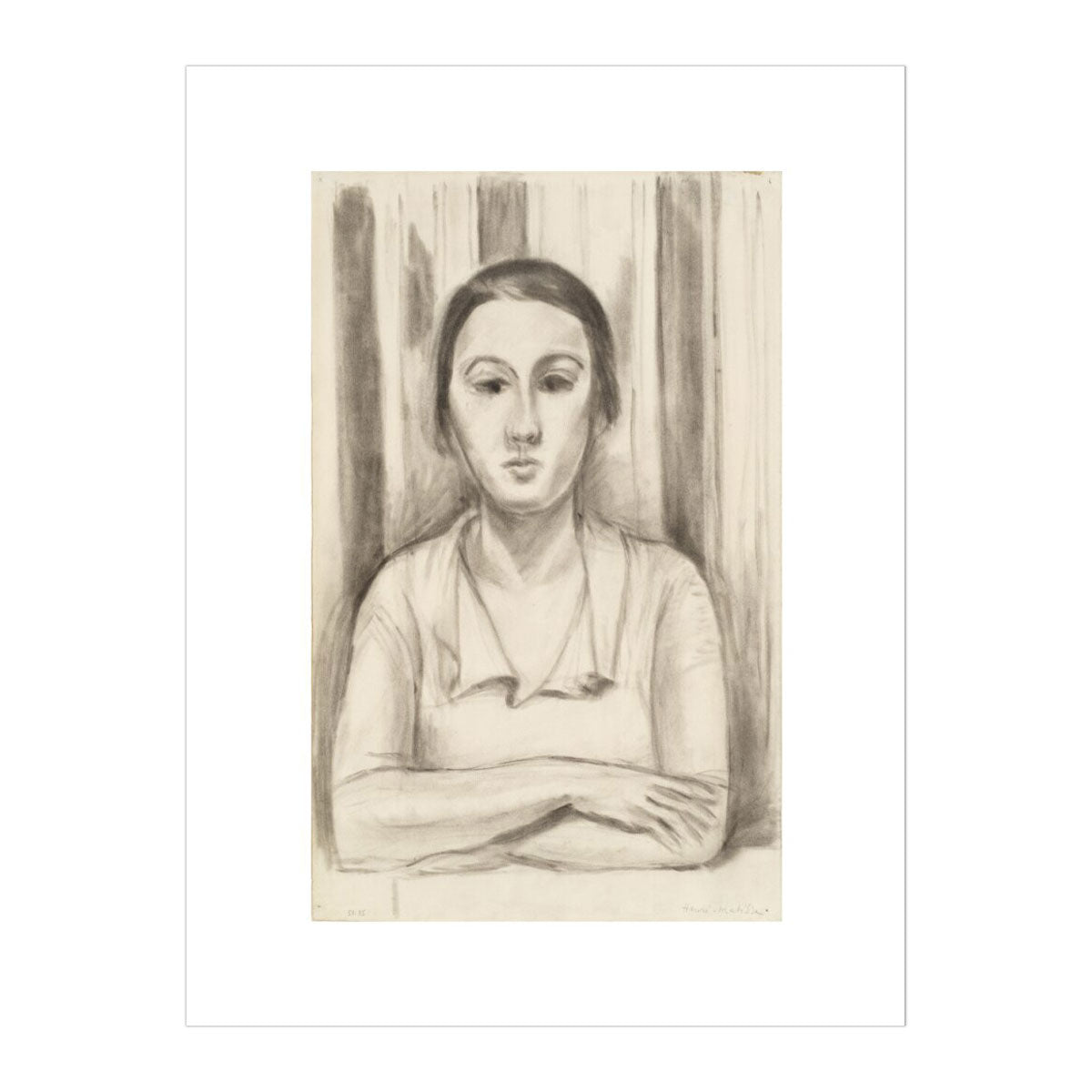 A Woman with her arms on a table